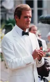  ??  ?? This file photo taken on August 16, 1984 shows British actor, Roger Moore during the shooting of the film series "James Bond", "A view to kill", in Chantilly.
