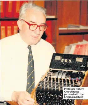  ??  ?? Professor Robert Churchhous­e pictured with the Enigma machine