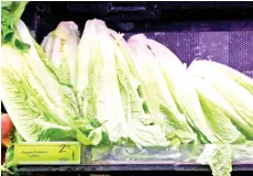  ?? — AFP photo ?? Romaine lettuce is seen on sale at a Whole Foods supermarke­t in Washington, DC.