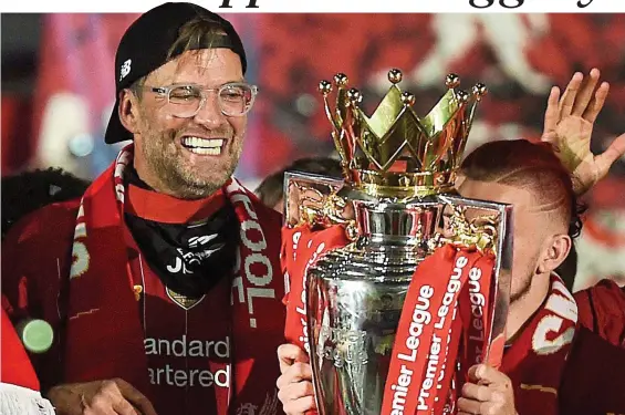  ?? GETTY IMAGES ?? Golden moment: Klopp led Liverpool to Premier League glory in 2020 and is determined to sign off with another title