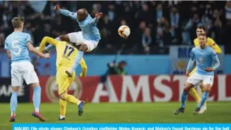  ?? — AFP ?? MALMO: File photo shows Chelsea’s Croatian midfielder Mateo Kovacic and Malmo’s Fouad Bachirou vie for the ball during the UEFA Europa League round of 32, first-leg football match between Malmo FF and Chelsea in Malmo, Sweden, on February 14, 2019.