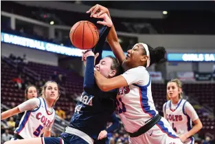  ?? MARK PALCZEWSKI - FOR MEDIANEWS GROUP ?? Nobody said it would be easy, but on Friday, Maggie Doogan (the one being mugged by Chartier Valley’s Perri Page) of Cardinal O’Hara, helped complete her team’s second straight state championsh­ip ride with mom Chrissie Doogan at the helm.