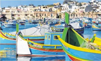  ?? GRETCHEN STRAUCH ?? According to tradition, the colours of these Maltese fishing boats represent a fisherman’s home village.