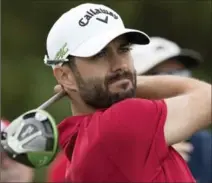  ?? CANADIAN PRESS FILE PHOTO ?? Research shows following Canadian Adam Hadwin around the golf course at the Presidents Cup can improve your health.