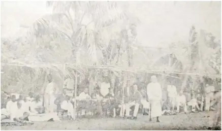  ?? Picture: FILE ?? The scene at Navuso, Naitasiri, in November 1874 when Mr E.L. Layard, administra­tor of Fiji, arrived to meet chiefs of the Colo mountain tribes to discuss the significan­ce of the Cession of Fiji to the British Crown. Ratu Savenaca Vakaruru, a high chief of Bau and the first Ratu Tui Lomaiviti, is seen addressing the Colo chiefs. Also in the photograph are Mr Layard, Captain Chapman of HMS Dido, Mr J.B Thurston (Colonial Secretary).