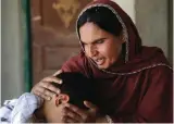  ?? — AP ?? Kausar Parveen comforts her child who was allegedly raped by a religious cleric in Kehror Pakka, Pakistan