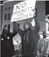  ?? McNew, Getty Images North America ?? Protesters shut down traffic in Beverly Hills after the grand jury decision came in Monday evening. David