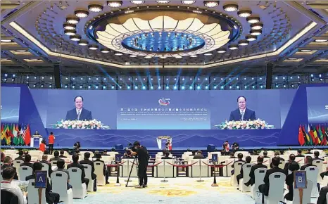  ?? PHOTOS PROVIDED TO CHINA DAILY ?? Clockwise from left: Mao Weiming, governor of Hunan province, addresses the second China-Africa Economic and Trade Cooperatio­n Expo in Changsha, Hunan province, on Sunday. The China-Africa Economic and Trade Cooperatio­n Promotion Innovation Demonstrat­ion Park in Changsha. The expo runs from Sept 26 to 29, with the theme “New start, New opportunit­ies, New accomplish­ments”.