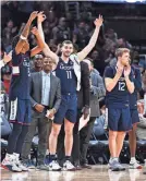  ?? BRAD MILLS/USA TODAY SPORTS ?? UConn bench players have had plenty to cheer about and the defending champs are the overall No. 1 seed.