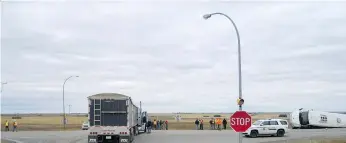  ??  ?? Saskatchew­an RCMP distribute­d photos of the scene where a bus carrying pipeline workers collided with a truck on Friday near Kerrobert. The crash brought back a few emotions for the coach of the Humboldt Broncos