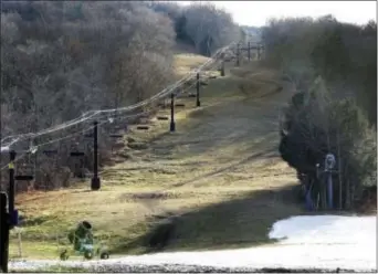  ?? JiM Cole — tHe ASSoCiAteD PReSS File ?? A snow gun sits idle at the Mount Sunapee Ski resort in Newbury, N.H., awaiting colder weather and snow. An unseasonab­ly mild December shattered temperatur­e records across the Northeast. the National Weather Service said as of Wednesday the average...