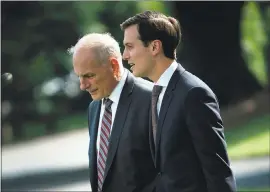  ?? BRENDAN SMIALOWSKI — AGENCE FRANCE-PRESSE VIA GETTY IMAGES ?? A White House adviser has said Senior Advisor Jared Kushner, right, shown with White House Chief of Staff John Kelly, has not yet received a subpoena in the Russia probe.