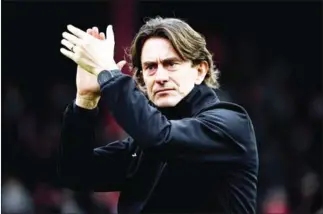  ?? AFP ?? Head coach Thomas Frank will lead Brentford to play in England’s top tier for the first time in 74 years after beating Swansea 2-0 in a Championsh­ip play-off final on May 29.