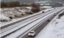  ??  ?? Cars make their way along the snow-covered A120 near Braintree in Essex. Photograph: Joe Giddens/PA