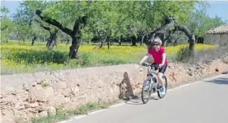  ?? PHOTOS: GREG OLSEN/FOR POSTMEDIA NEWS ?? Thousands of cyclists head to the island of Majorca each spring and fall. The consistent­ly sunny climate and the gorgeous views make it great for touring by bicycle.