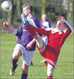  ?? Picture: Andy Jones FM4721057 ?? Maidstone Kestrels’ Ryan Dismore (red) puts his foot in against Park Royal Reserves