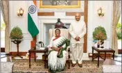  ?? PTI ?? Newly sworn-in President Droupadi Murmu with outgoing President Ram Nath Kovind in her office at Rashtrapat­i Bhavan, in New Delhi, on Monday