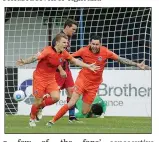  ??  ?? THAT’S ANDY! Andrew Neal wheels away in celebratio­n as Truro continue their winning run