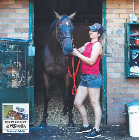  ?? Picture: JAMES CROUCHER ?? Redzel, pictured with strapper Haylee Day at Peter and Paul Snowden's stables, will line up in Saturday's $2.5 million T J Smith Stakes