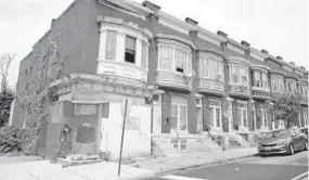  ??  ?? The building at 2032 Penrose Ave., which once housed a corner store, has accumulate­d a $1.76 million debt. The listed owner died in 1989.