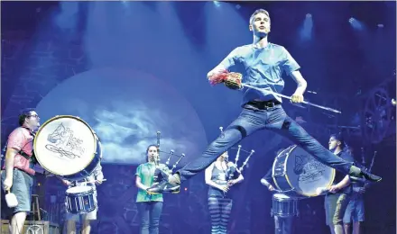  ?? DESIREE ANSTEY/JOURNAL PIONEER ?? World champion Highland dancer, Daniel Carr, leaps into the air during a rehearsal scene for the College of Piping and Celtic Performing Arts summer show, “Great Scot!”