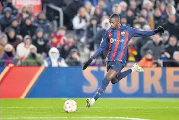  ?? AFP ?? Barcelona’s Ousmane Dembele scores against Real Sociedad at the Camp Nou stadium.