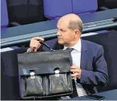  ??  ?? It’s in the bag: German Finance Minister Olaf Scholz said the ECB has fulfilled the demands made by the constituti­onal court