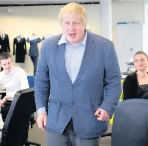  ??  ?? Boris Johnson meets workers at clothing and uniform manufactur­ers Simon Jersey during a visit as part of the Vote Leave EU referendum campaign
