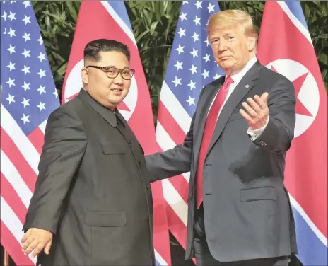  ?? PHOTO: KEVIN LIM/AP ?? Good progress between Donald Trump and Kim Jong-un yesterday failed to lift either South Korea’s won or MSCI’s 24-country emerging stocks index.