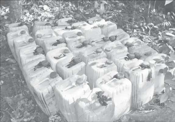  ?? (GDF photo) ?? Fuel containers found abandoned in the Kaieteur National Park