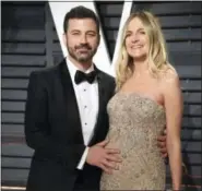  ?? PHOTO BY EVAN AGOSTINI — INVISION — AP, FILE ?? Jimmy Kimmel, left, and his pregnant wife Molly McNearney at the Vanity Fair Oscar Party in Beverly Hills The hole-in-the-heart problem that plagues comedian Jimmy Kimmel’s newborn son is one of the most common heart-related birth defects,