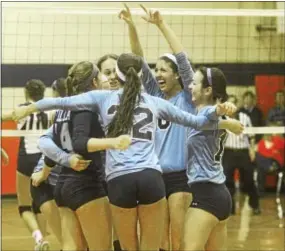  ?? ADRIANNA HOFF — 21ST CENTURY MEDIA ?? Villa Maria players celebrate after winning a point against Pope John Paul II in their District 1 Class AA Volleyball final at Plymouth-Whitemarsh High School on Thursday.