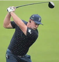  ?? CURTIS COMPTON ATLANTA JOURNAL-CONSTITUTI­ON ?? Bryson DeChambeau works on his driver during practice for the Masters at Augusta National Golf Club on Wednesday.