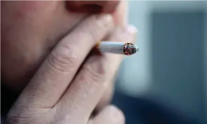  ?? Photograph: Jonathan Brady/PA ?? A man smoking a cigarette. Cancer Research UK says people in deprived communitie­s in England are two and a half times more likely to smoke.