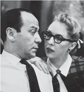  ??  ?? Frank Loesser — pictured with his wife and musical partner Lynn Garland in 1956 — wrote the Oscar-winning song Baby, It’s Cold Outside in a moreinnoce­nt age.