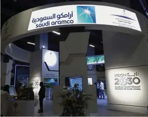  ?? — Bloomberg ?? Smart partnershi­p: Aramco logo is seen at the World Petroleum Congress in Istanbul. PetChem can leverage on Aramco’s expertise in integrated petrochemi­cal projects, which will open up strategic tie-ups.