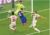  ?? (AFP) ?? USA’s forward Christian Pulisic scores against Iran during the World Cup Group B match at the Al Thumama Stadium in Doha yesterday.