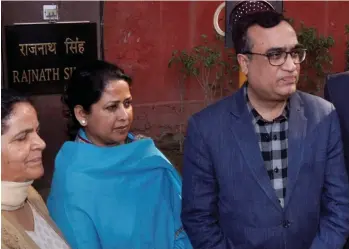  ?? — PTI ?? Delhi Congress leaders Sharmistha Mukherjee and Ajay Maken after meeting Union home minister Rajnath Singh in New Delhi on Tuesday.