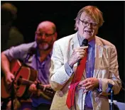  ?? LEILA NAVIDI / MINNEAPOLI­S STAR TRIBUNE ?? Garrison Keillor sings during a live broadcast of “A Prairie Home Companion” in May 2016 at the State Theatre in Minneapoli­s. Keillor said he inadverten­tly put his hand on a woman’s bare back.