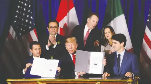  ?? SEAN KILPATRICK / THE CANADIAN PRESS FILES ?? From left, then-Mexican President Enrique Pena Nieto, U.S. President Donald Trump and Canada’s Prime Minister Justin Trudeau at the Nov. 30,
2018, signing ceremony for the new United States-Mexico-Canada Agreement. The USMCA replacing NAFTA came into force on Wednesday.