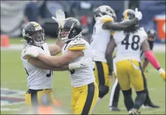  ?? MARK ZALESKI - THE ASSOCIATED PRESS ?? Pittsburgh Steelers linebacker­s Alex Highsmith (56) and T.J. Watt (90) celebrate after a 45-yard field goal attempt by Tennessee Titans kicker Stephen Gostkowski was no good in the final seconds of the fourth quarter in an NFL football game Sunday, Oct. 25, 2020, in Nashville, Tenn. The Steelers won 27-24.