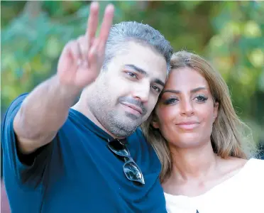  ??  ?? «Je suis fou de joie à l’idée de [...] pouvoir partager le même toit que mon épouse ce soir», a déclaré le Canadien de 41 ans Mohamed Fahmy après sa libération hier.