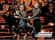  ??  ?? Dancing with Neil on the show