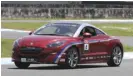  ??  ?? Peugeot RCZ with Gus Camacho at Clark Internatio­nal Speedway