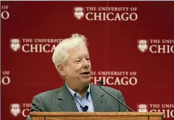  ?? PAUL BEATY — THE ASSOCIATED PRESS ?? University of Chicago professor Richard Thaler speaks during a news conference after winning the Nobel economics prize Monday in Chicago. Thaler won for documentin­g the way people’s behavior doesn’t conform to economic models. As one of the founders of...