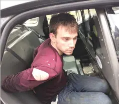  ??  ?? This image released by the Metropolit­an Nashville Police Department, shows Reinking after he was captured by police. — AFP photo