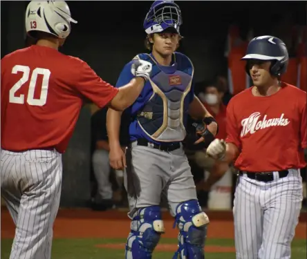  ?? BY KYLE ADAMS KADAMS@SARATOGIAN.COM @KASPORTSNE­WS ON TWITTER ?? Nick Kondo decided against a high-five after hitting a home run in the sixth inning of the second game of a double-header, igniting a 7-run rally and come-from-behind victory on July 6, 2020.