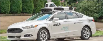  ??  ?? The fatal accident in Arizona, involving a self-driving vehicle operated by ride-sharing giant Uber, has raised concerns that the driverless car industry may be moving too fast. — Uber photo