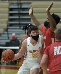  ??  ?? Jordan Sebagh of Troy Athens drives against the Chippewa
Valley defense during a district semifinal game Thursday. Sebagh scored 15 points.