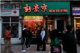  ?? Photograph: Cole Burston/The Guardian ?? The New Ho King restaurant is seeing a surge in business due to the hip-hop battle between Kendrick Lamar and Drake.